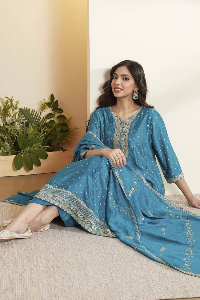 Woman wearing a blue BIBA kurta set